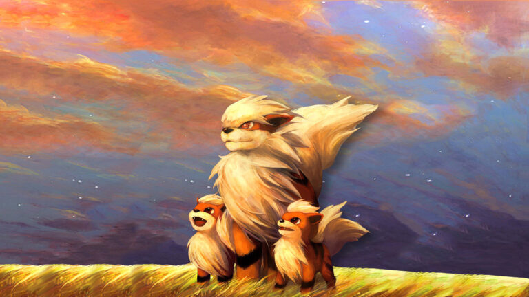 Arcanine with a pair of Growlithes in the wild