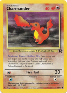 Charmander — Team Rocket · 50/82 · 2000 (Level 9. Its Gather Fire Poké-Power pulls a Fire Energy across from one of your other Pokémon. Printed as 1st Edition and Unlimited.)